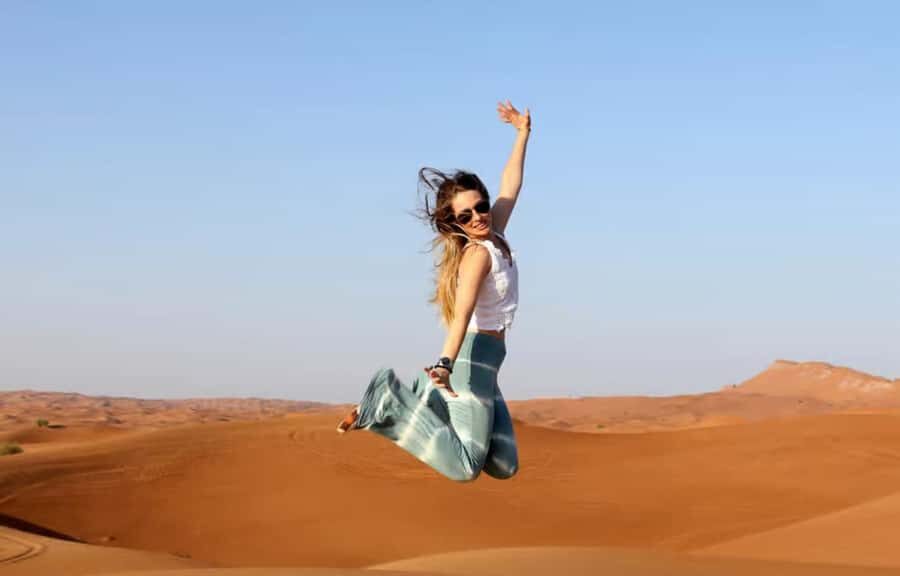 Doha: ATV Quad, Buggy Dune Bashing,Camel Ride & Sandboarding - The Tourist Point jump: sandboarding plus more dune bashing