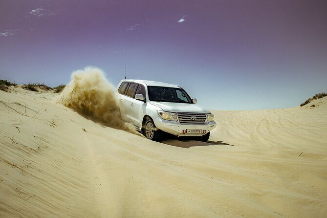 Doha Delights City Tour with Desert Safari and Inland Sea Visit - Getting set up in Doha: pickup, ID, and the first “wow” stops