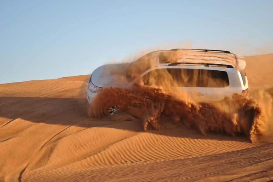 Doha: Desert 4x4, ATV/Quad, Camels, Sandboarding, Inland sea - The 1-Hour Land Cruiser Drive: City Views, Then Instant Reality Check