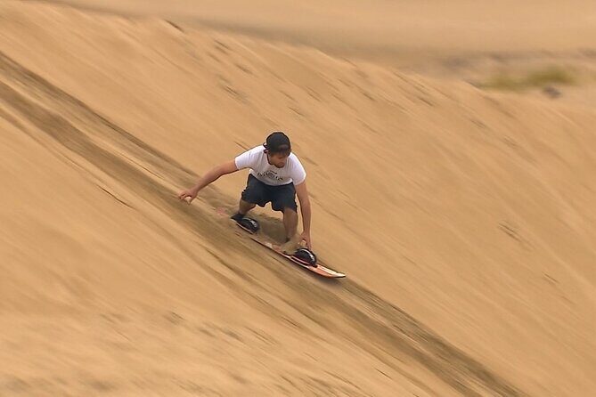 Doha Desert Quad Bike adventure with group, and Sand dune Driving - Inland Sea stop: 4WD dune driving, quad biking, and sand boarding