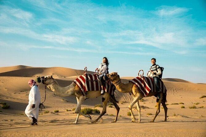 Doha Desert Safari Camel Ride, Sandboarding and Inland Sea - Sandboarding on the dunes: fun, thrills, and safe play