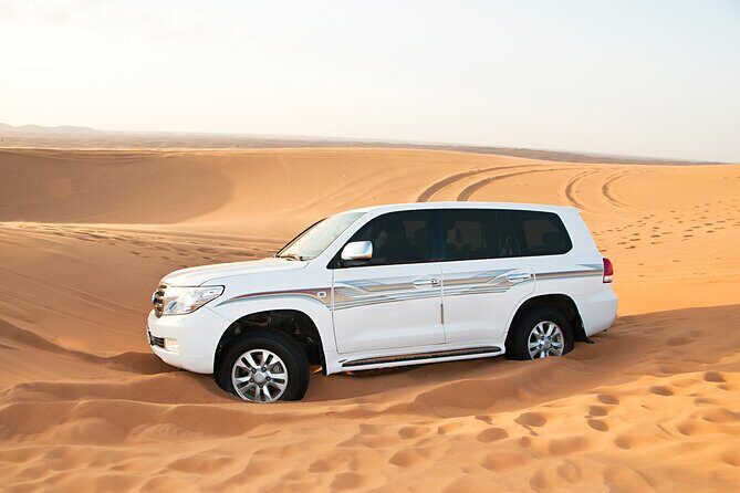 Doha Desert Safari Dune Bashing Camel Ride Sandboarding - Inland Sea Beach: Where the Main Adventure Lands