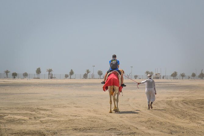 Doha Desert Safari: Dunebashing, Camel, Sandboarding & Inland Sea - Getting Out of Doha: The 4x4 Pickup That Sets the Tone