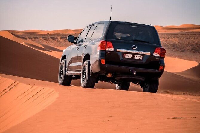 "Doha Desert : Safari, Sandboarding, Camel Ride & Inland Sea" - Ash Shaqra Dune Bashing and Sandboarding: The Main Event
