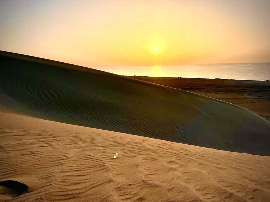Doha: Desert Safari Sunrise Tour/Sunset Tour - Inland Sea beach break and sandboarding that takes effort