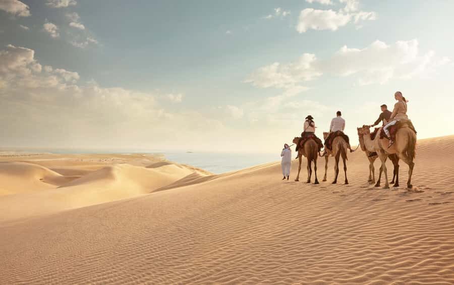 Doha: Desert Safari with Dune Bashing and Inland Sea - H2: Mesaieed photo stops, camel ride time, and possible extras