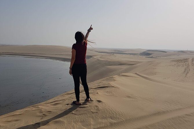 Doha :Half Day Desert Safari | Camel Riding | ATV | Sand Surfing - Dune Bashing and Sand Surfing: The Main Event, Up Close