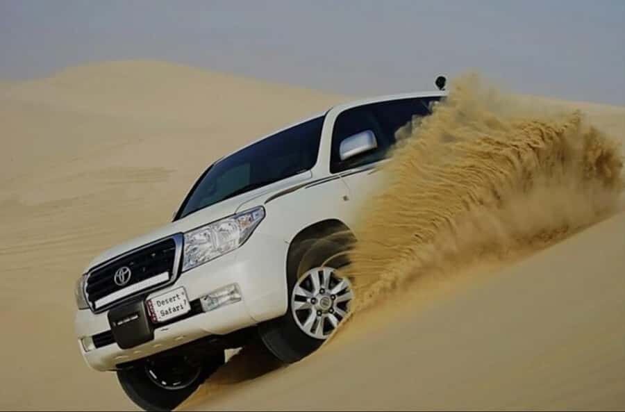 Doha: Half Day Desert Safari With Camel Ride & Sand Boarding - Mesaieed Stop: Tea, Photos, and the Optional Quad Bike