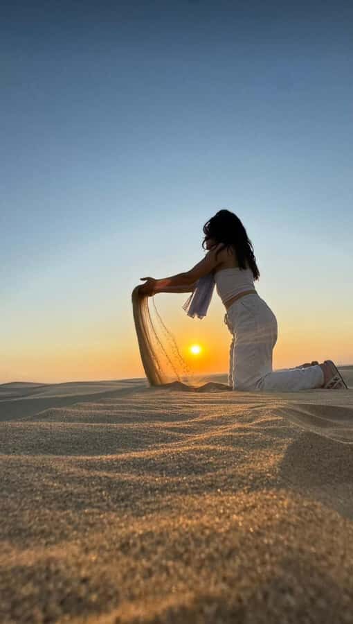 Doha: inland sea Tour With Dune Bashing &Sandboarding fun - Camel ride at the beach: short, fun, and good for photos