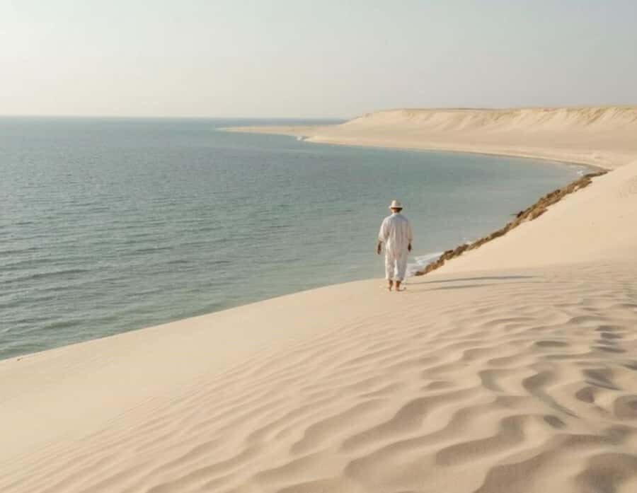 Doha: InlandSea Tour,Camel,Sand Boarding With All Activities - Inland Sea desert time: dune bashing with control and swagger