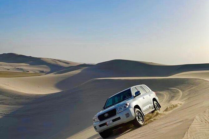 Doha Layover Desert Safari, Camel Ride, Sand Boarding, Inland Sea - Desert dune rides and sand boarding: Adventure, but on a human timeline
