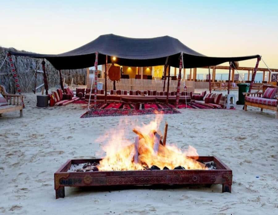 Doha: Overnight Desert Camping With BBQ Dinner & Breakfast - Doha Pickup to Al Wakrah: Camel Ride and Desert Coffee