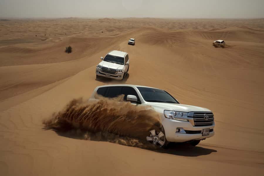 Doha : Private Desert Safari With Camel Ride & Sand Boarding - Inland sea at Khor al Adaid: where sunset feels different