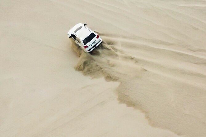 Doha-Private half day safari Sunrise/Sunset - Sunrise/Sunset Safari at Sealine Beach: Why the Timing Matters