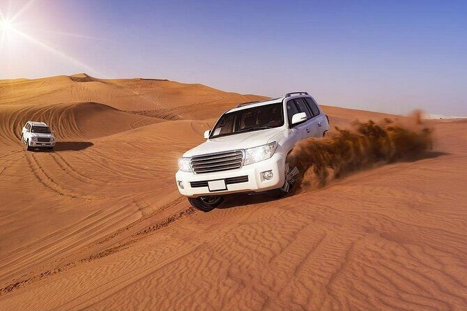 Doha: Quad Bike, Dune Bashing, Camel Ride & Inland Sea Tour - Inland Sea hour: dune bashing plus sand boarding energy