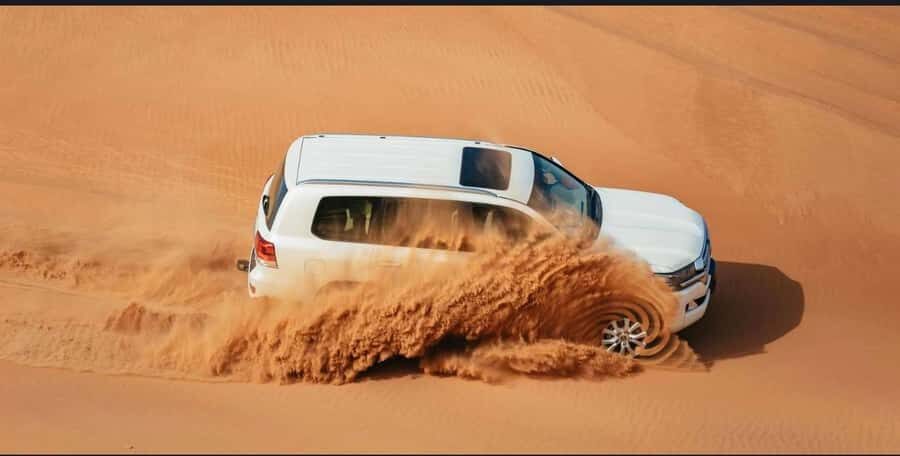 Doha: Safari, Camel Ride, Sand boarding and Inland Sea Tour - Optional quad biking add-on: one hour of extra speed