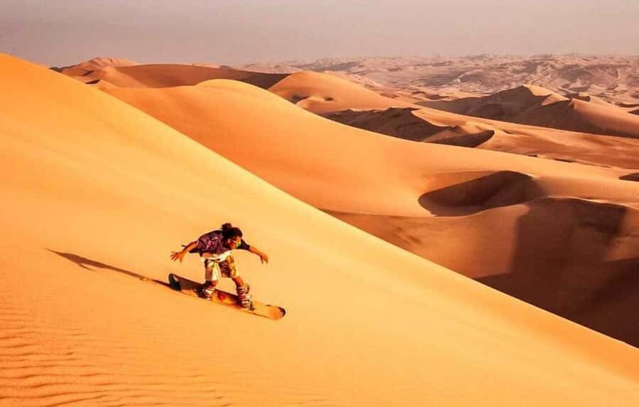 Doha: Shared Desert Safari, Sandboarding, Camel Ride - Sandboarding: Snowboard Fun, Desert Setting