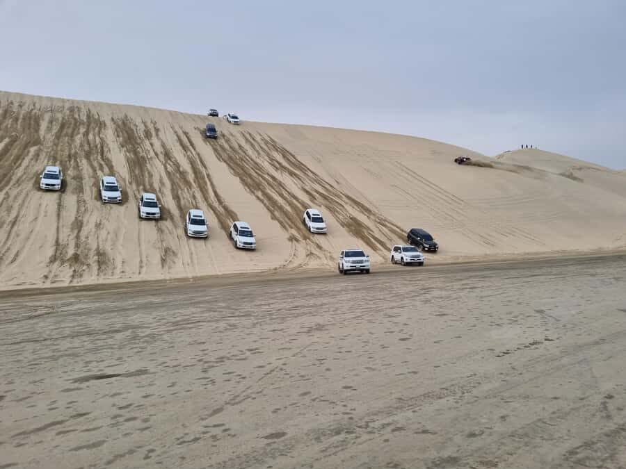 Doha: Sunset desert tour with Camel Ride, Inland Sea & Tea - Why Khor Al Adeid turns a desert ride into a real moment