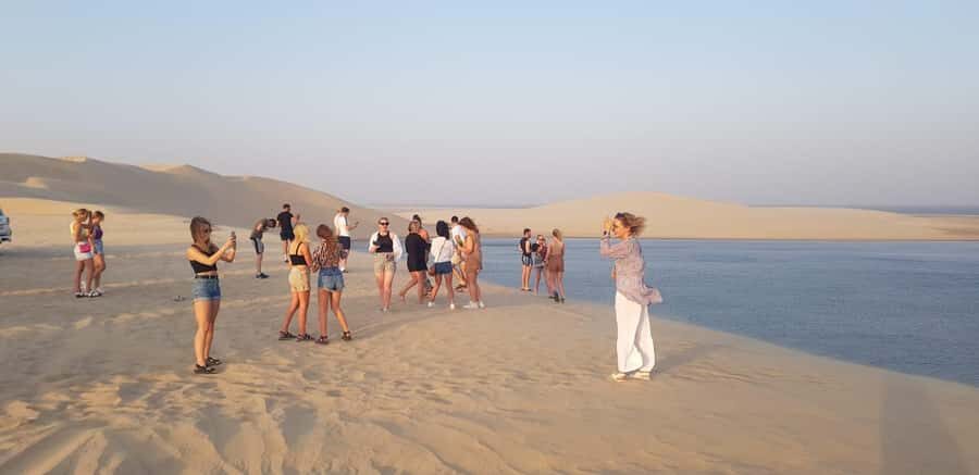 Doha: Sunset desert tour with Camel Ride, Inland Sea & Tea - The Mesaieed camel ride: short and classic