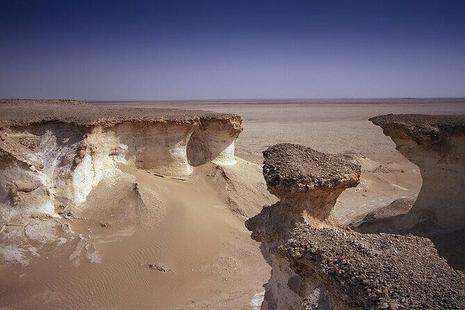 Doha: West Coast Tour Serra and Mushroom Rocks - Mushroom Rocks: Wind-sculpted formations that look like a trick of the eye