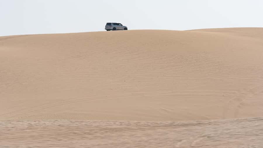 Doha:Private Desert Safari, Falcon, Sandboarding,inland sea - Inland Sea Stop #2: More Dune Time for Better Timing