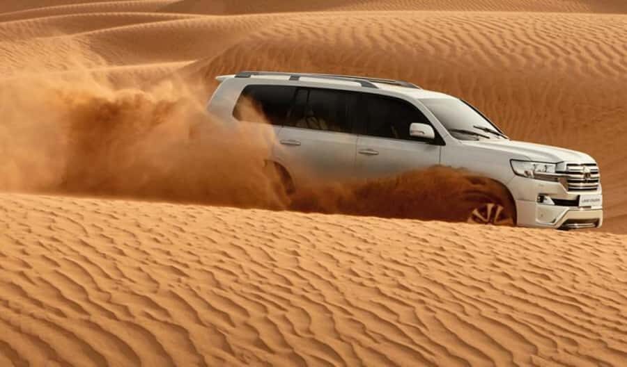 Explore desert Qatar: Off-Road Adventures, dune bashing Tour - Camel Area Tea, Tire-Prep, and the Bedouin-Style Moment
