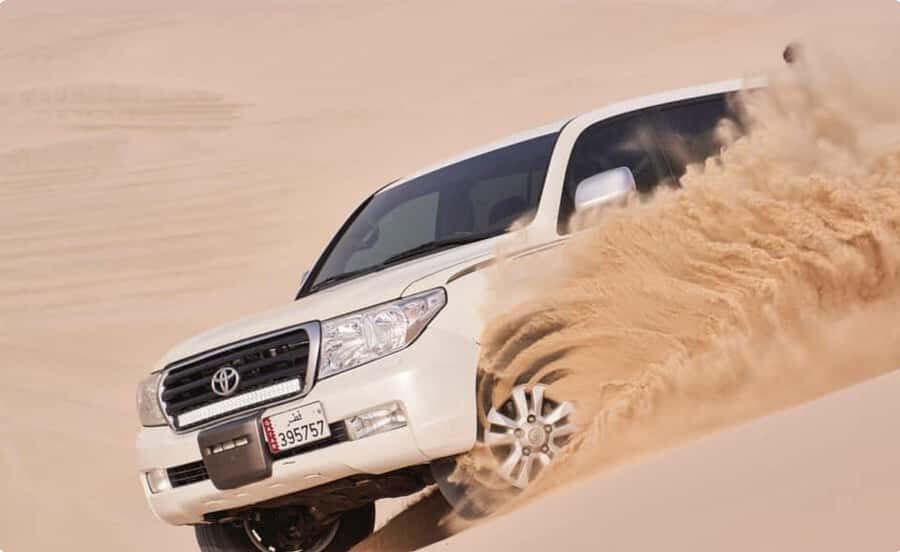 From Doha: Inland Sea Desert Safari with All Activities - Sandboarding: Snowboarding Energy, Desert Setup