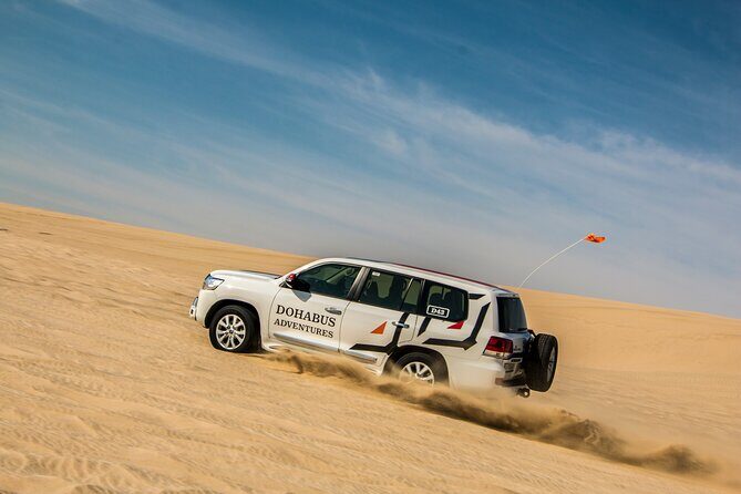 Full-day Qatar desert safari: dune bashing, sandboarding, camels - Sandboarding and camels: what’s included, what’s not