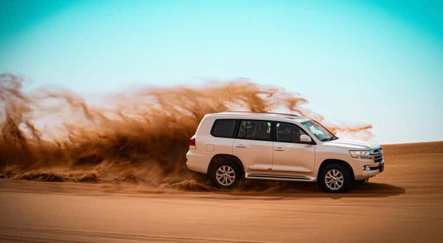 Relax Inland Sea Tour, Desert Safari, Camel Ride, SandBoard - Sandboarding session: how it fits in and what to wear