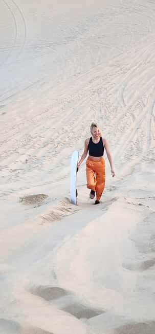 Sunrise or Sunset desert Safari with Sandboarding in Qatar - Dune bashing in a 4x4: thrill with a calm, safe feel