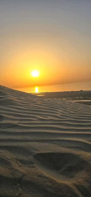 Sunrise or Sunset desert Safari with Sandboarding in Qatar - Pickup from Al Wakrah and the drive out of Doha