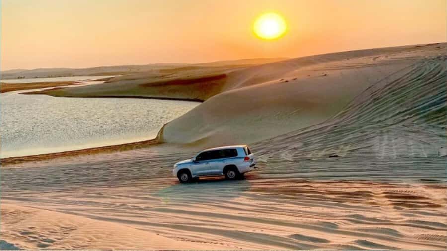 Sunrise/Sunset DuneBashing,CamelRide InlandSea &Sandboarding - From Doha Pickup to Inland Sea Drive in an Air-Conditioned Comfort Bubble
